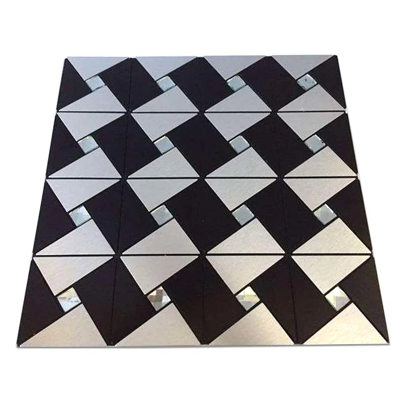 Self-adhesive mosaic tile sheet with black and white triangles and reflective insets