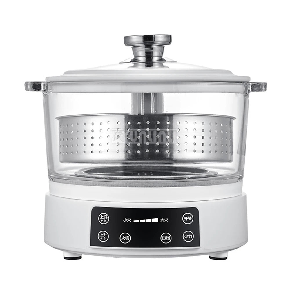 White electric rice cooker with transparent lid and perforated steaming basket, front view.