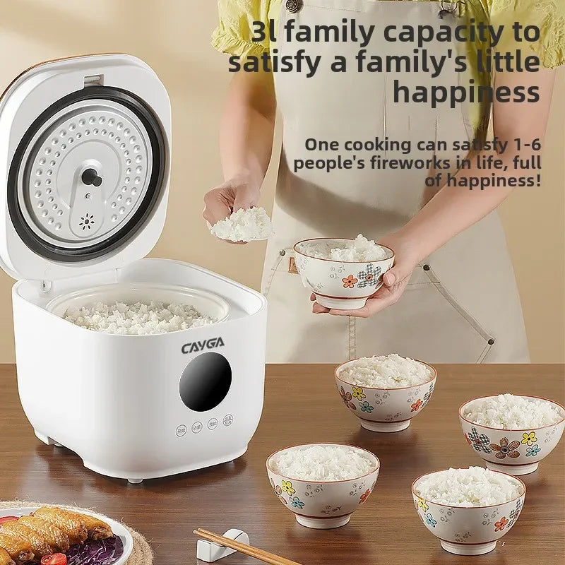 White CAYGA rice cooker with open lid and ceramic inner pot, hands holding bowl portions