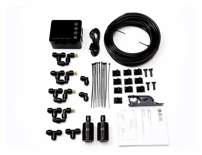 Automatic mist spray system kit components with controller, tubes, nozzles, and fittings