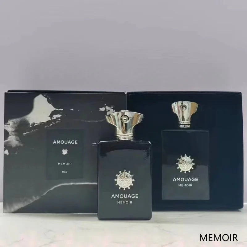 Amouage Memoir Man EDP 100ml: woody aromatic perfume in a sleek black bottle with silver cap and branded emblem.