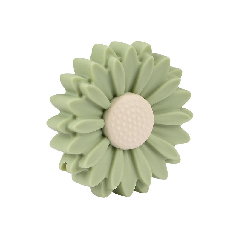 Sage green silicone flower baby teething toy for soothing sore gums.