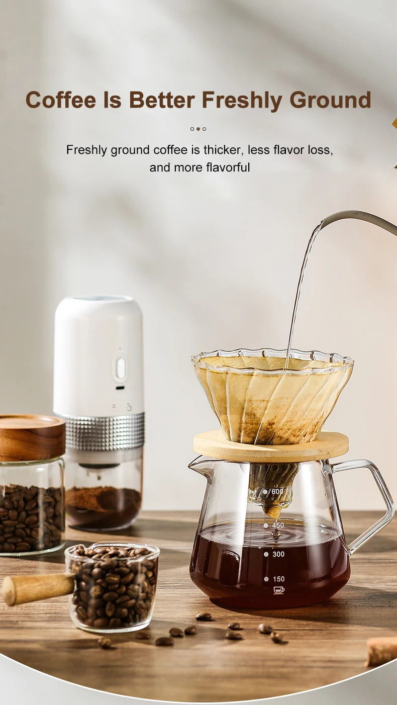 Glass pour-over coffee maker with 600ml scale, wooden base, and portable white electric burr coffee bean grinder.