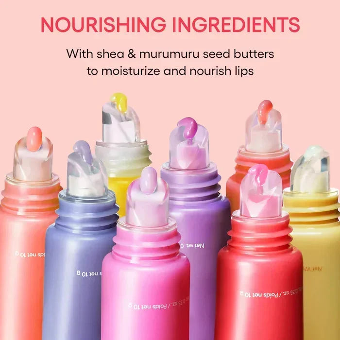 Laneige Lip Glowy Balm set with colorful, glossy tubes and moisturizing shea butter texture for hydrated lips.