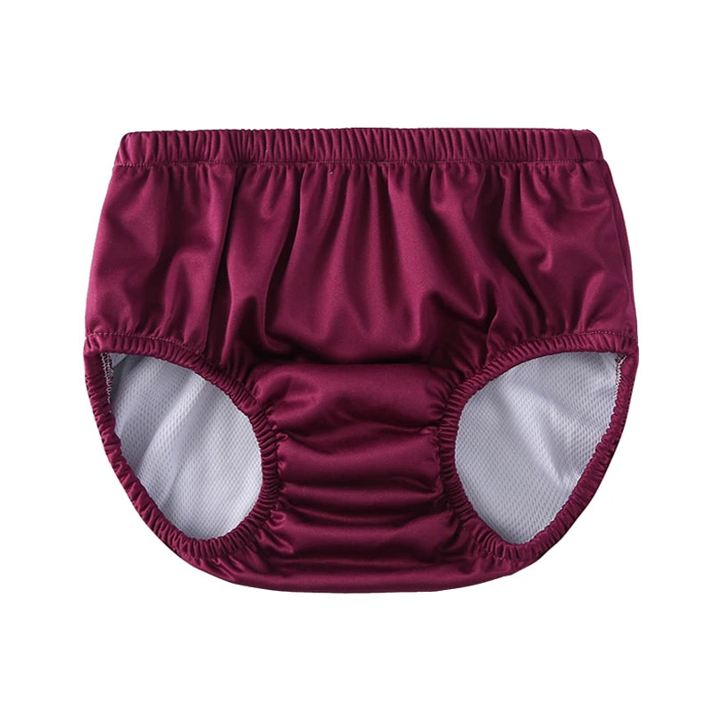 Maroon reusable cloth baby diaper cover with elastic waistband and white mesh lining.