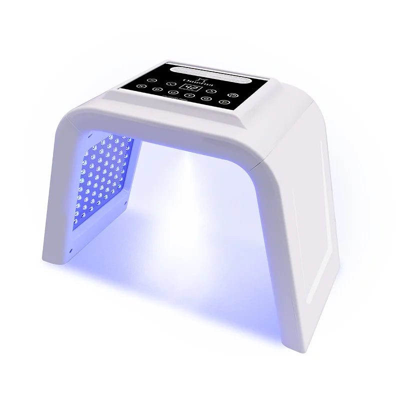 White 7-color PDT LED light therapy facial mask device with digital touch screen control panel for home skincare.