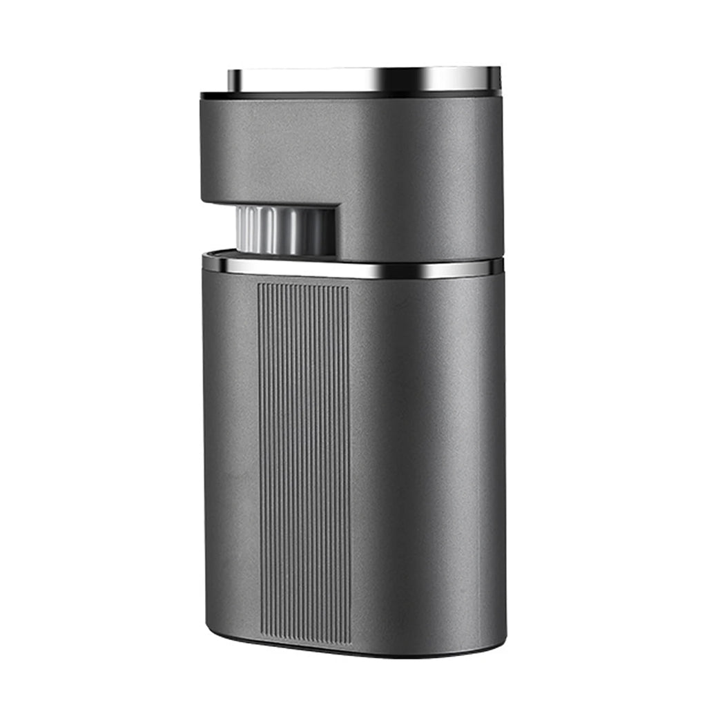Modern gray electric coffee grinder with vertical ribbing and metallic accents in a compact, minimalist design.