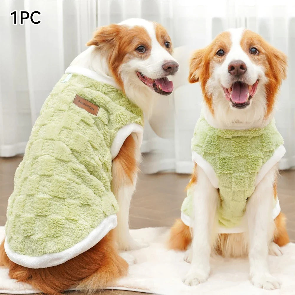 Two dogs wearing a soft, sage green fleece winter vest for warmth. Available in sizes S-8XL for cats and dogs.