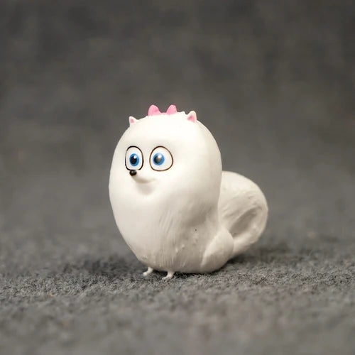 Cute white Gidget dog figurine from Secret Life of Pets, perfect for home decor or as a collectible gift.