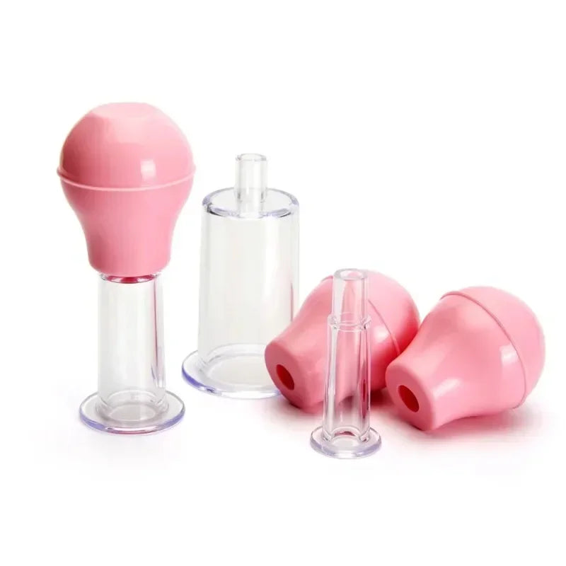 Four facial massage cupping tools with pink rubber suction bulbs and detachable clear plastic cylinders.