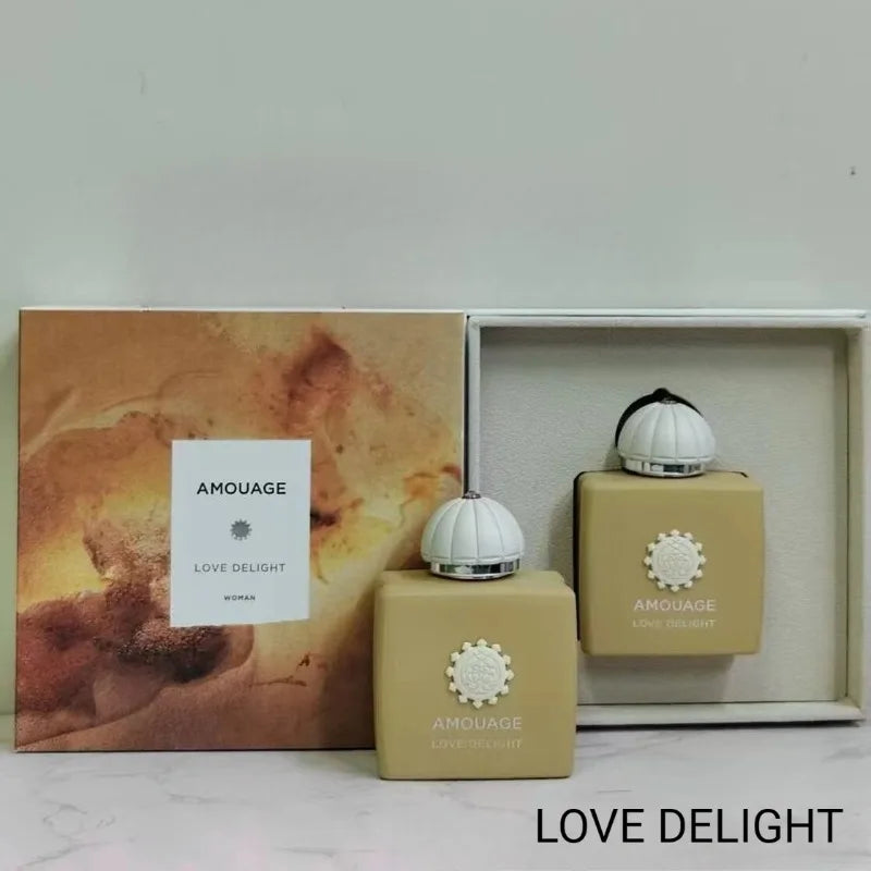 Amouage Love Delight Women EDP: Elegant square bottle with dome cap, 100ml luxury feminine fragrance gift set.