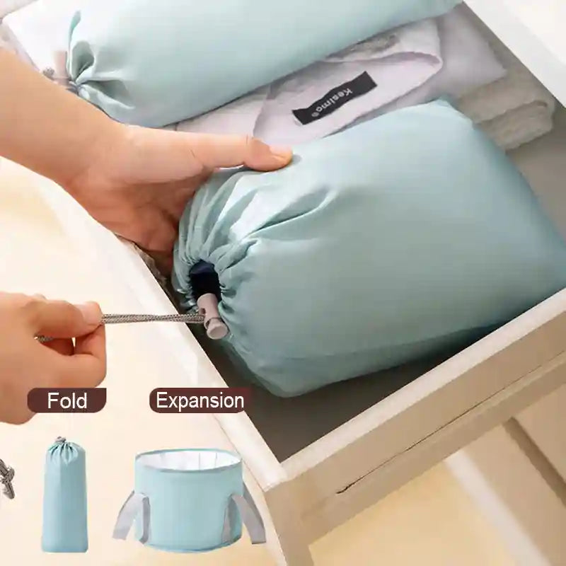 Foldable light blue ionic foot detox spa basin in a compact drawstring bag for easy storage and travel.