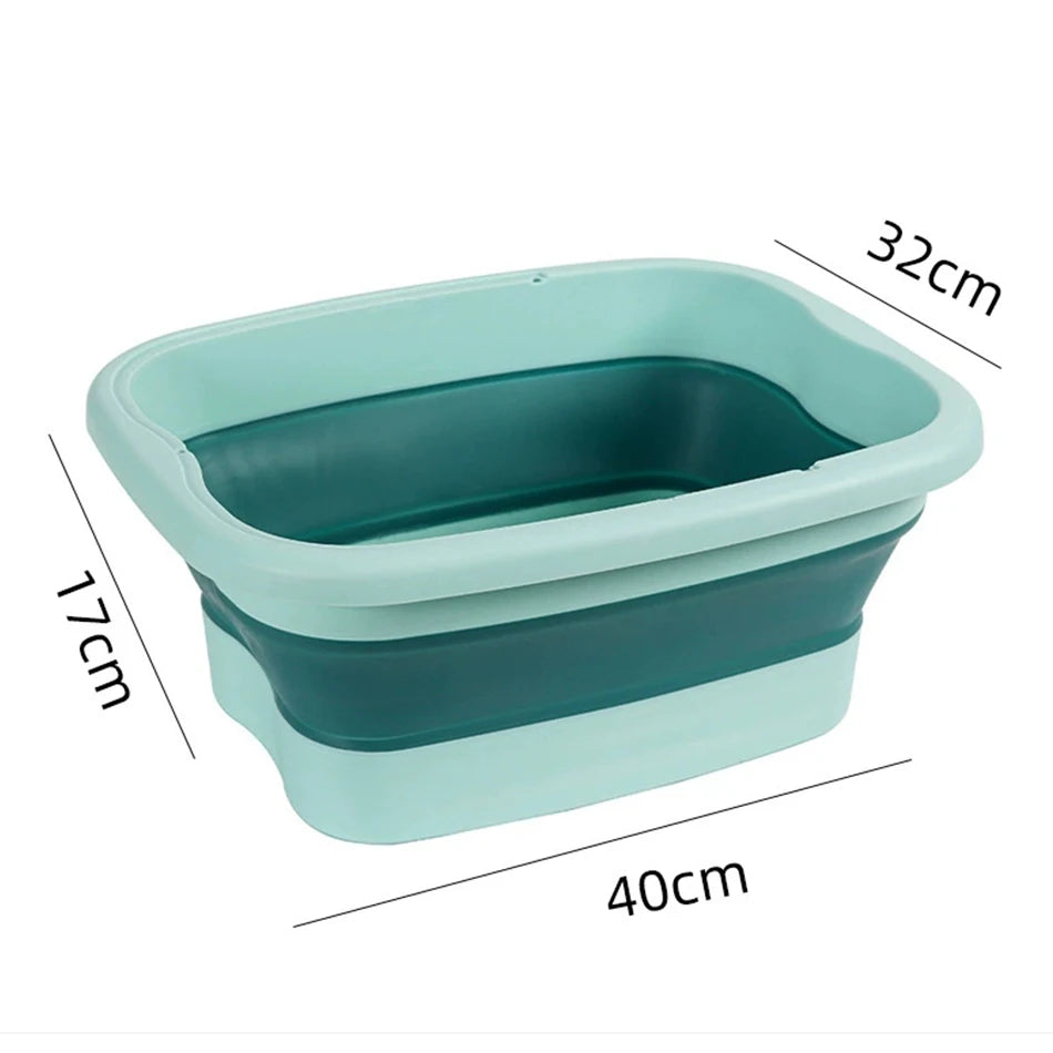 Foldable silicone foot bath tub in light and dark green, portable design for travel, 40x32x17cm dimensions.
