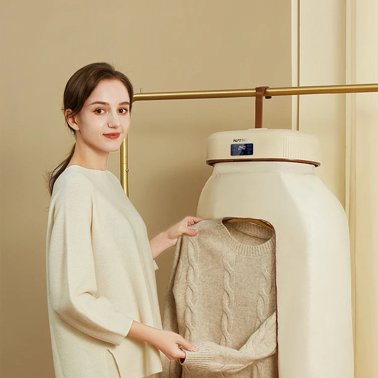 Tidesmit portable mini steam clothes dryer with smart touch control UV PTC drying and perfuming features.