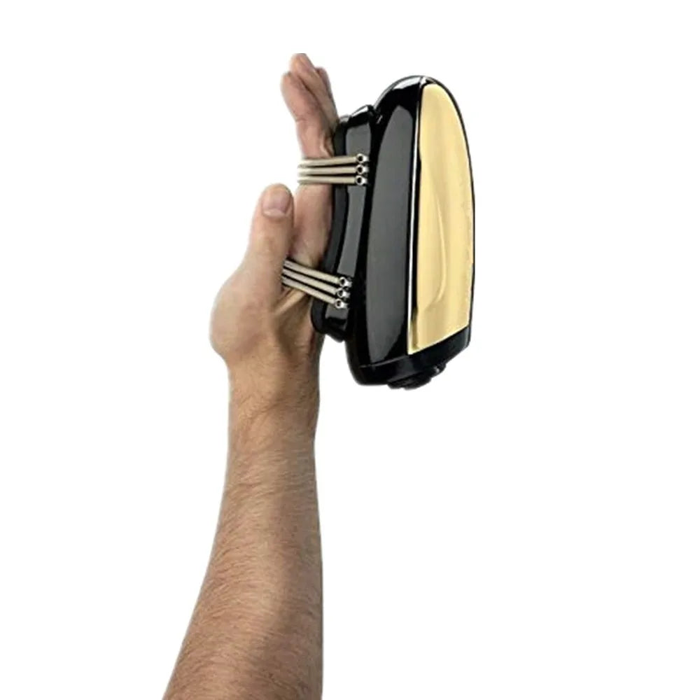 Hand wearing a black and gold handheld cordless massager with two metal finger-loop nodes, isolated on white.