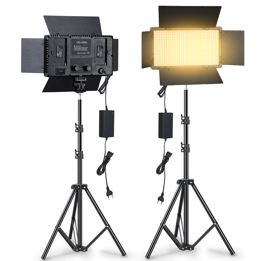 LED video light panel with adjustable barn doors on a black tripod stand, displaying both front and rear views.