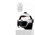 White integrated head and eye massager helmet with remote control for scalp and neck therapy and relaxation.