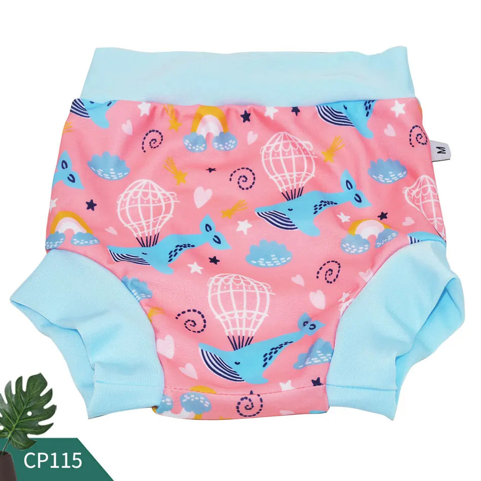 Size M baby swim diaper with pink whale, rainbow, and hot air balloon print for infant water play.