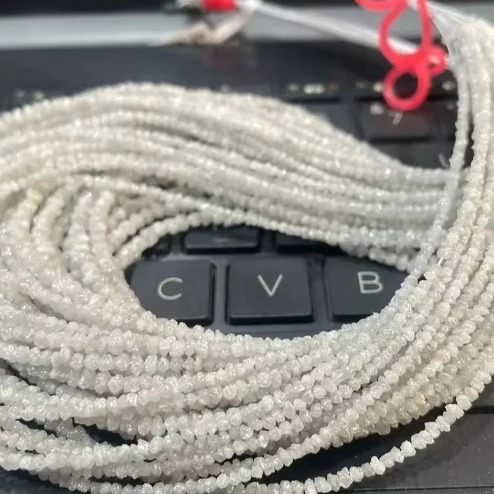 White raw diamond bead strands with small 2–3mm beads, tightly looped
