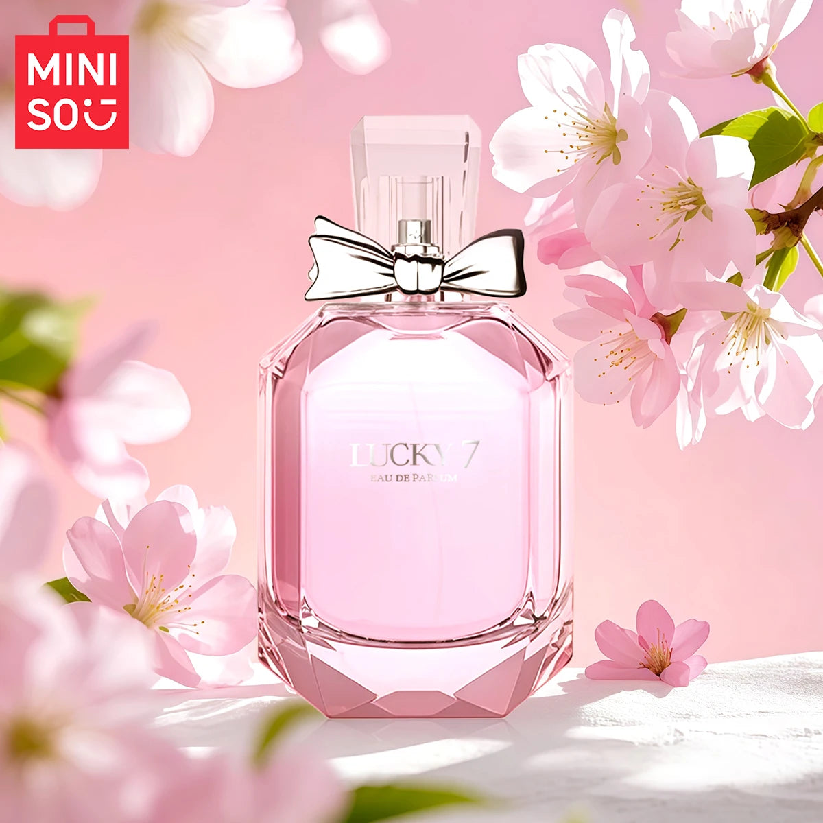 MINISO Lucky 7 Goddess EDP: Floral women’s fragrance in a luxury hexagonal pink glass bottle with silver bow cap.