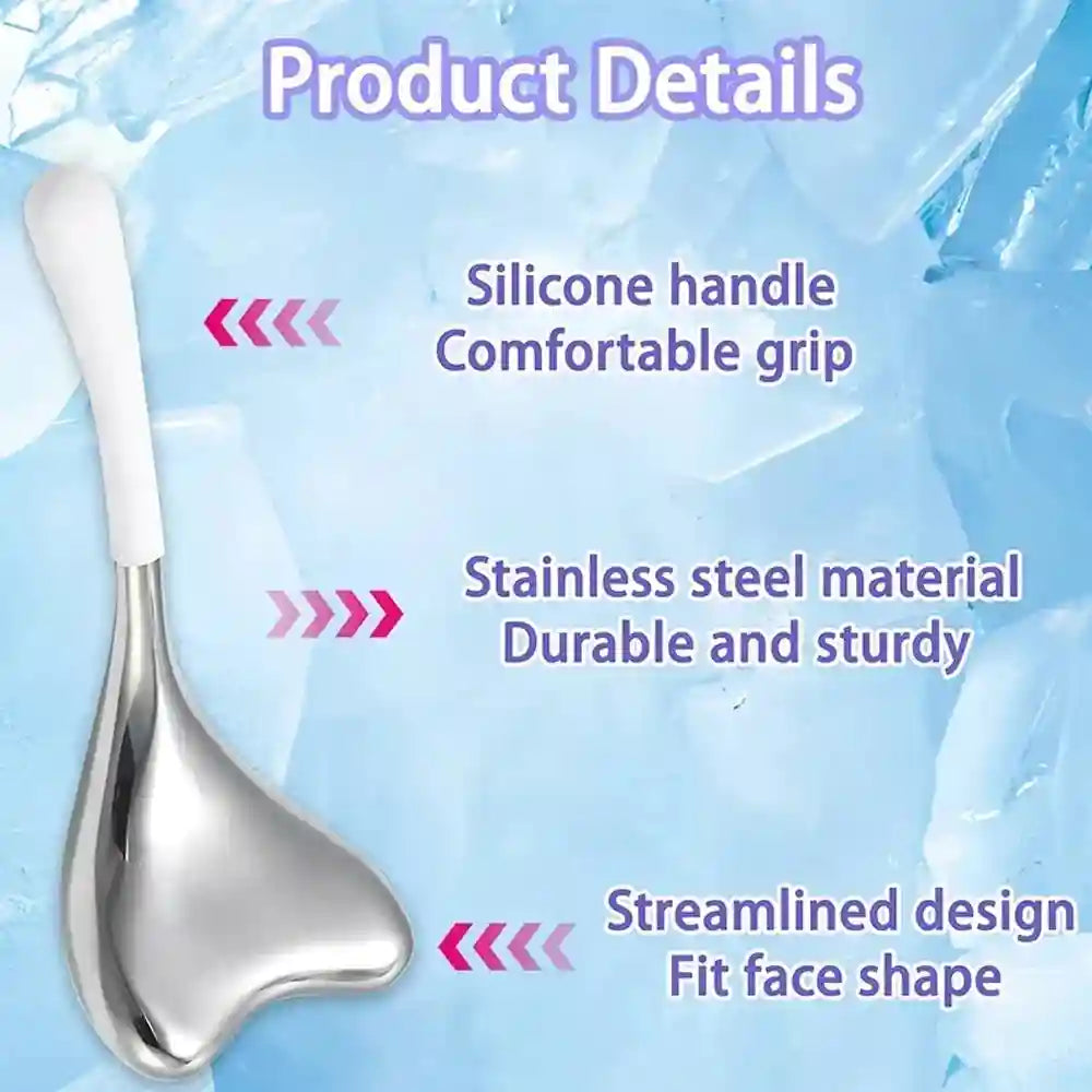 Heart-shaped stainless steel facial massage tool with a white silicone handle against an icy blue background.