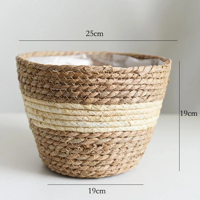 Light brown straw woven plant pot basket planter with open rim