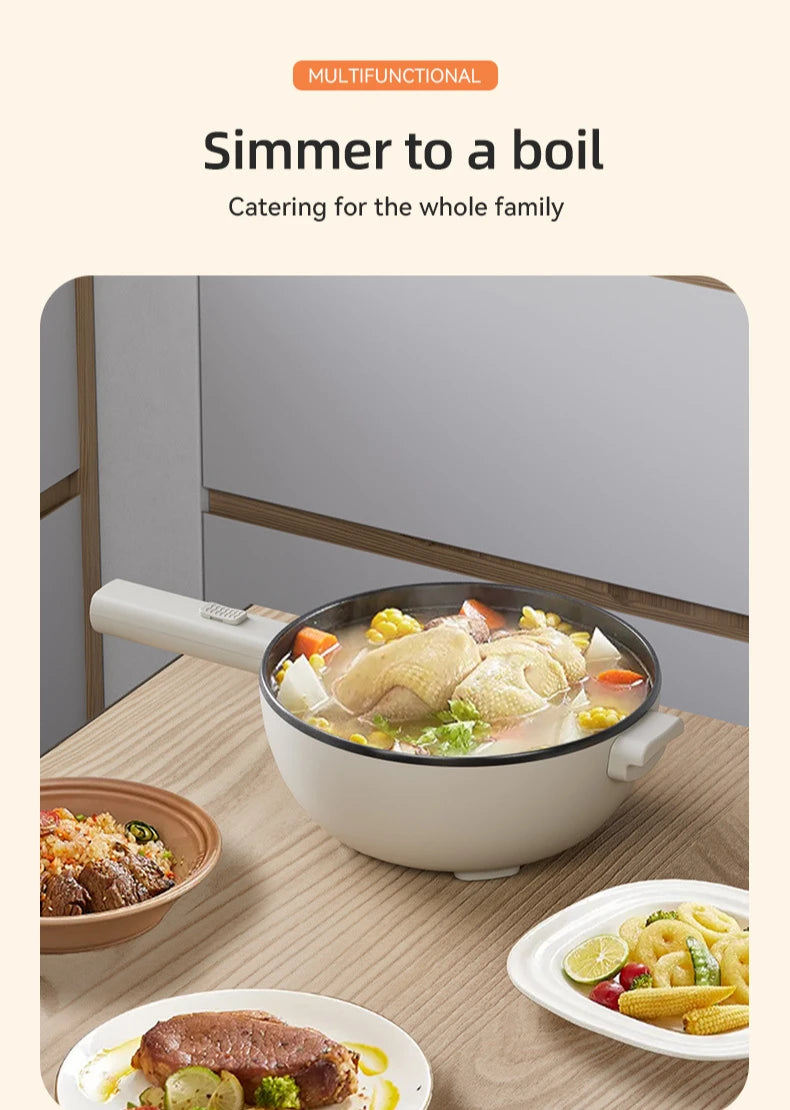 White electric hot pot with black nonstick cooking pan and side handle