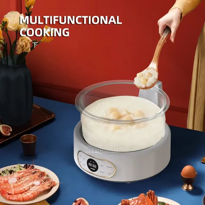 White multi-cooker with clear lid and stainless steaming pot holding white food