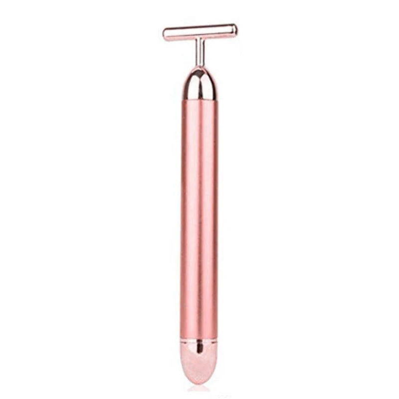 Rose gold T-shaped electric vibrating facial massager bar with a cylindrical handle and smooth metallic finish.