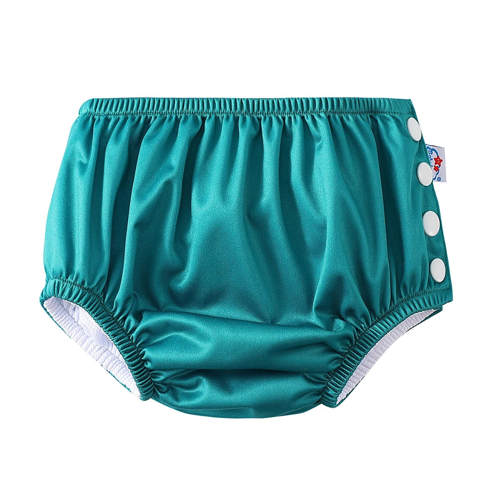 Teal reusable baby cloth diaper with side snap buttons for adjustable fit. Premium baby care essential.