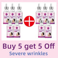 Ten glass bottles of anti-wrinkle facial essence with pink labels and dropper caps, arranged around a red plus sign.