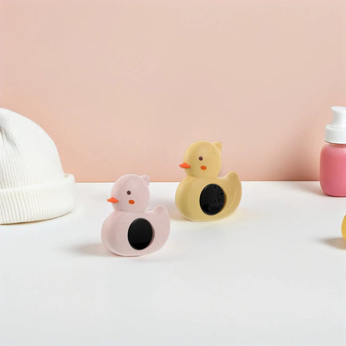 Pink and yellow duck digital baby thermometers for non-contact infrared forehead health monitoring.