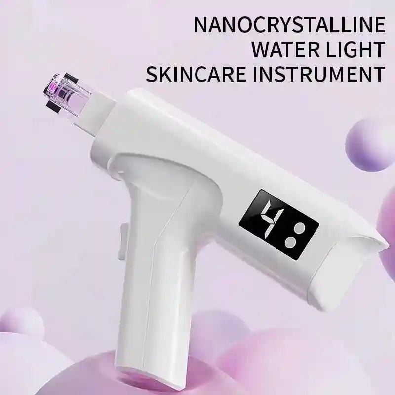 White nanocrystalline skincare device with a digital display and needle head for facial serum application.