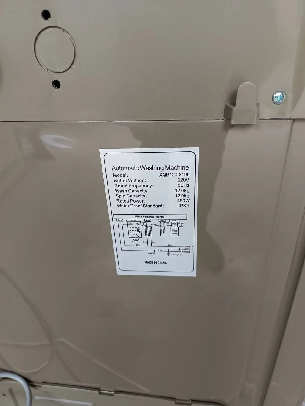 Tidesmit 12kg fully automatic wave wheel washing machine with blue light anti-winding feature, angle view 14