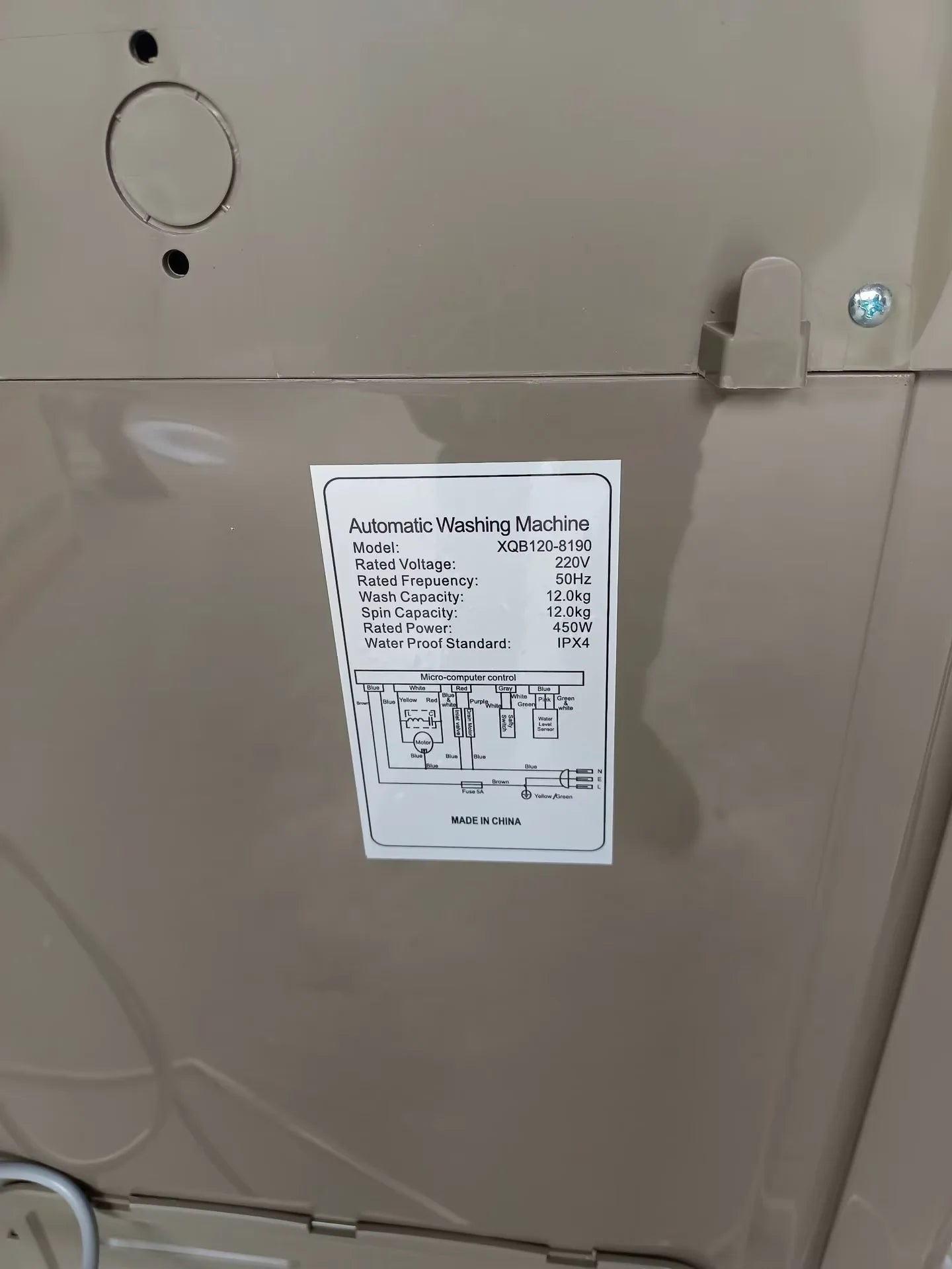 Tidesmit 12kg fully automatic wave wheel washing machine with blue light anti-winding feature, angle view 14