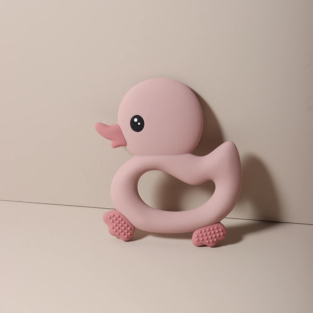 Pink duck silicone baby teething toy for relief.