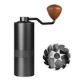 Black manual coffee grinder with metal body, wooden handle, and detailed stainless steel burr set for precision.