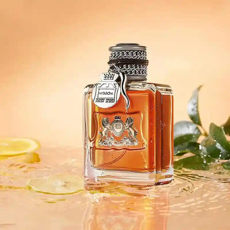 JEAN MISS 100ml woody Eau de Toilette for men. Luxury square glass bottle with crest, chain detail, and lemon notes.