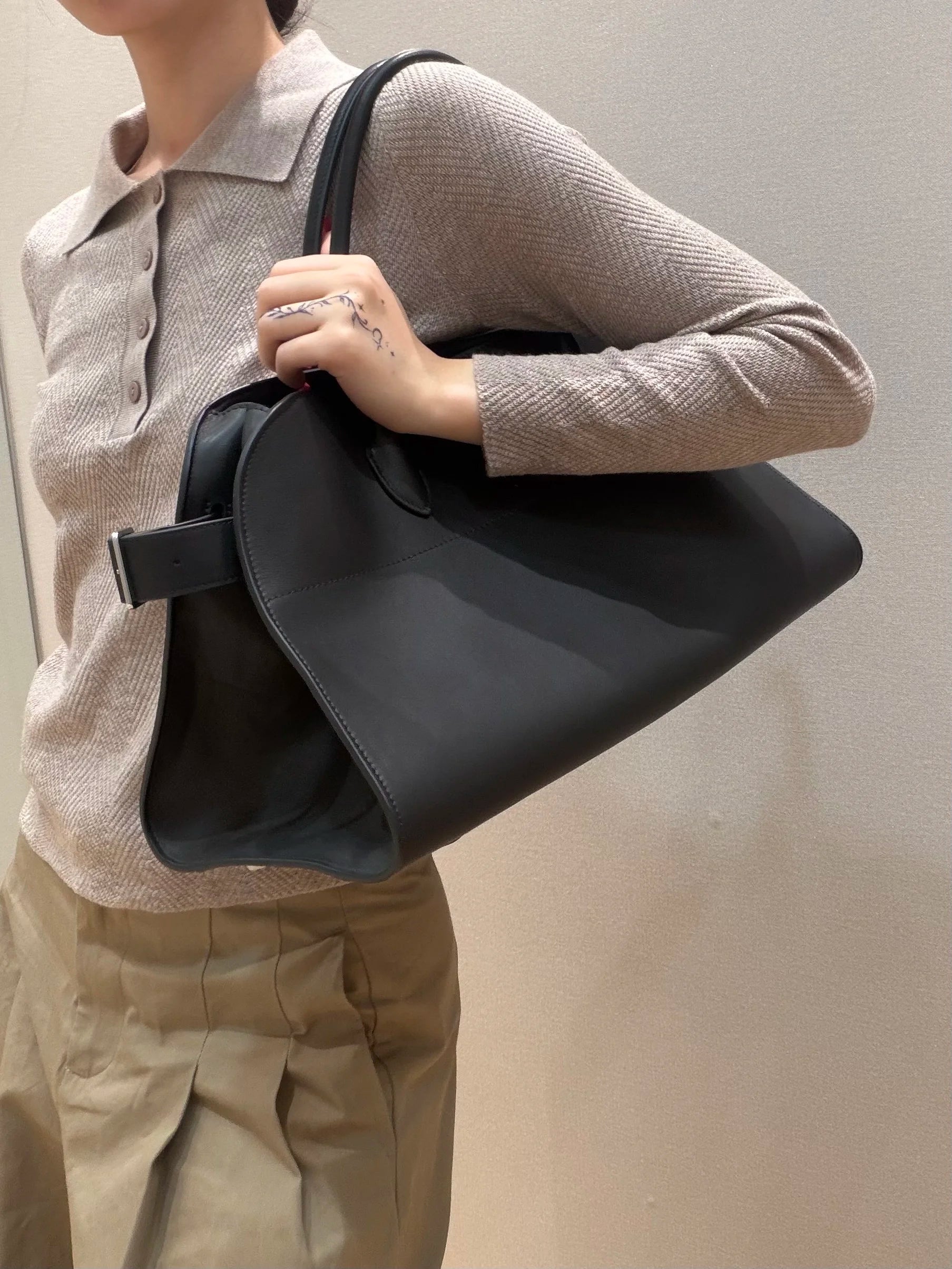Unisex saddle leather all steel hardware inner sheepskin single shoulder large capacity hand-held horizontal bag