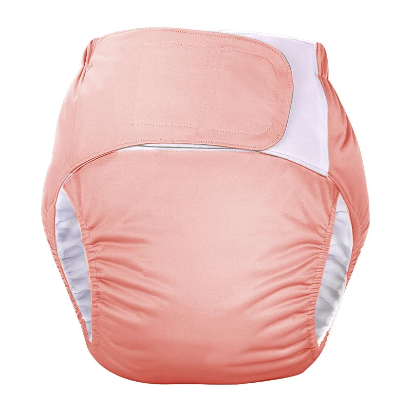 Solid coral reusable cloth baby diaper with adjustable hook-and-loop waistband for secure fit.