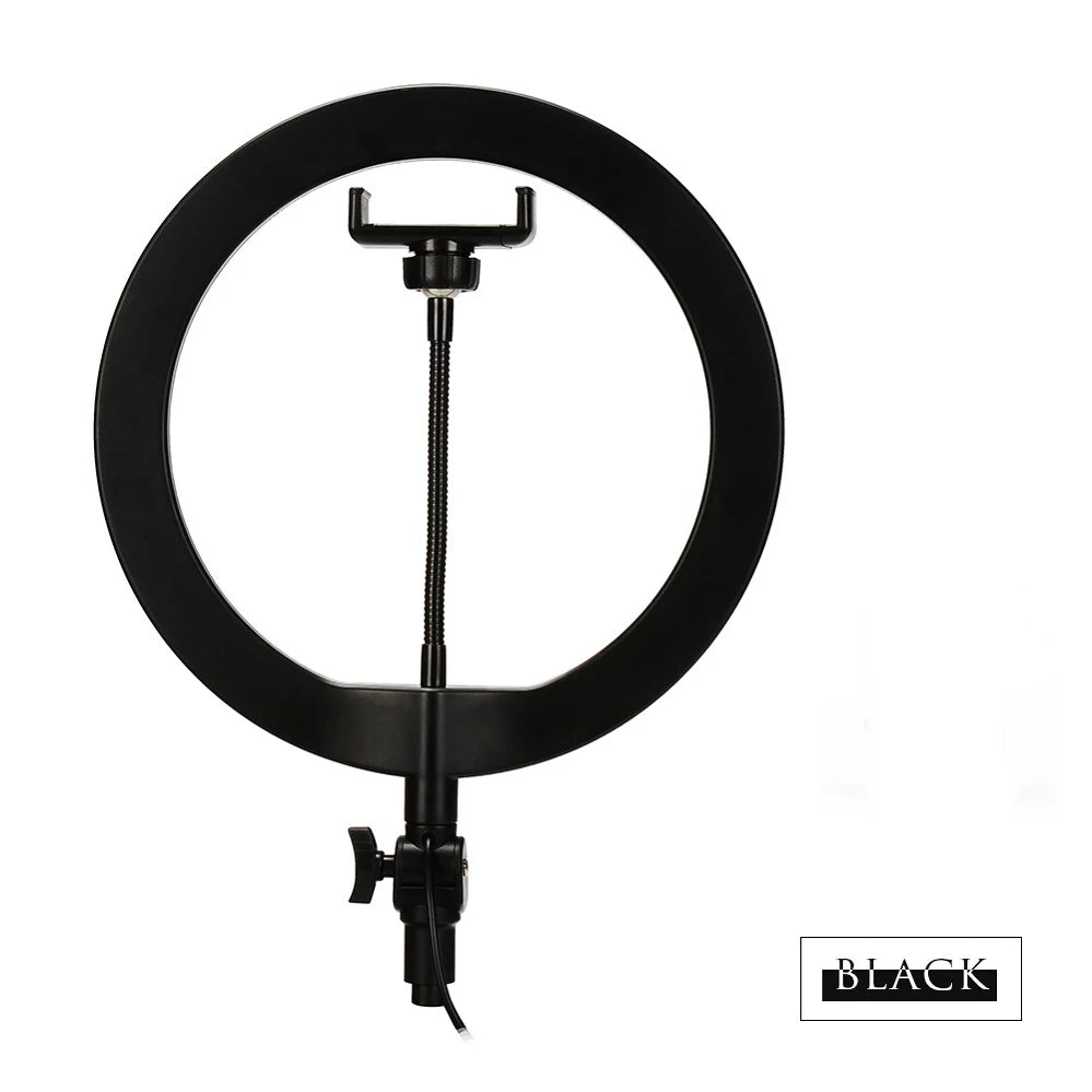 Black circular ring light with a central adjustable smartphone mount for photography and video recording.