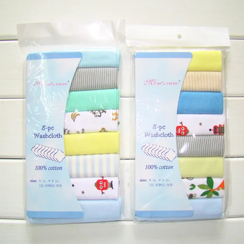 Two packs of Mom's Care 8-pc cotton baby washcloths, 9x9 inch, featuring colorful assorted prints and stripes.