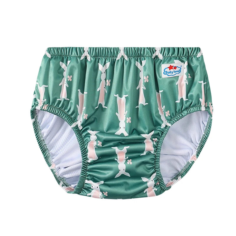 Babyland reusable cloth diaper in green with white bunny rabbit print for baby care.