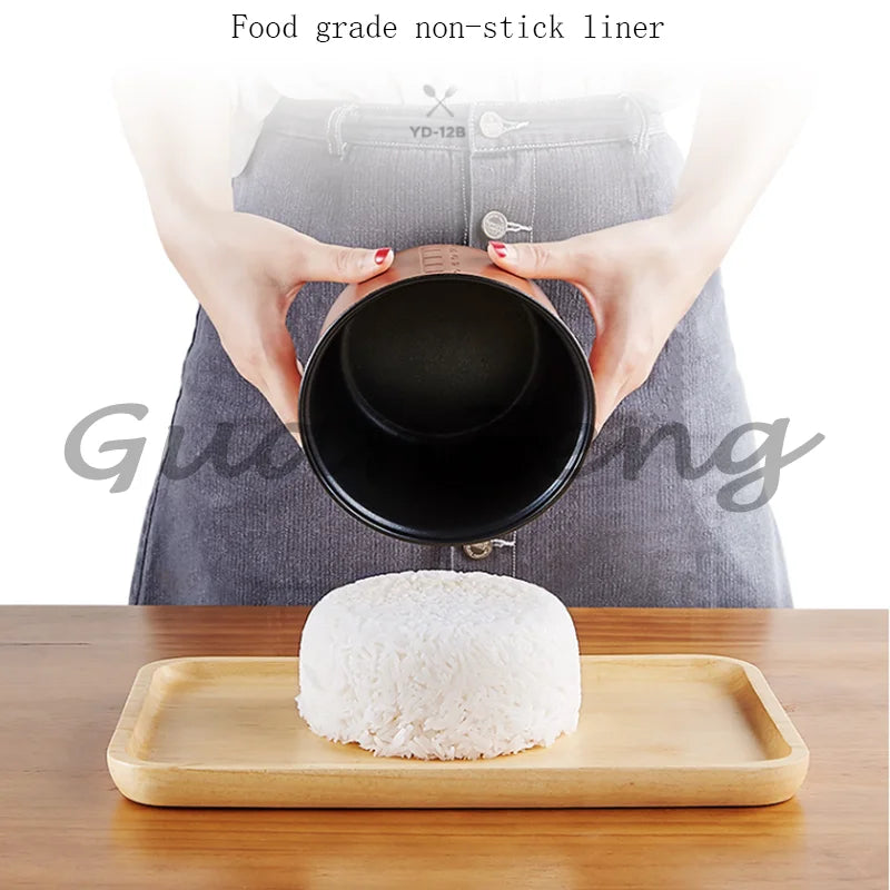 Portable mini rice cooker inner pot with non-stick liner, steaming rice ready for serving