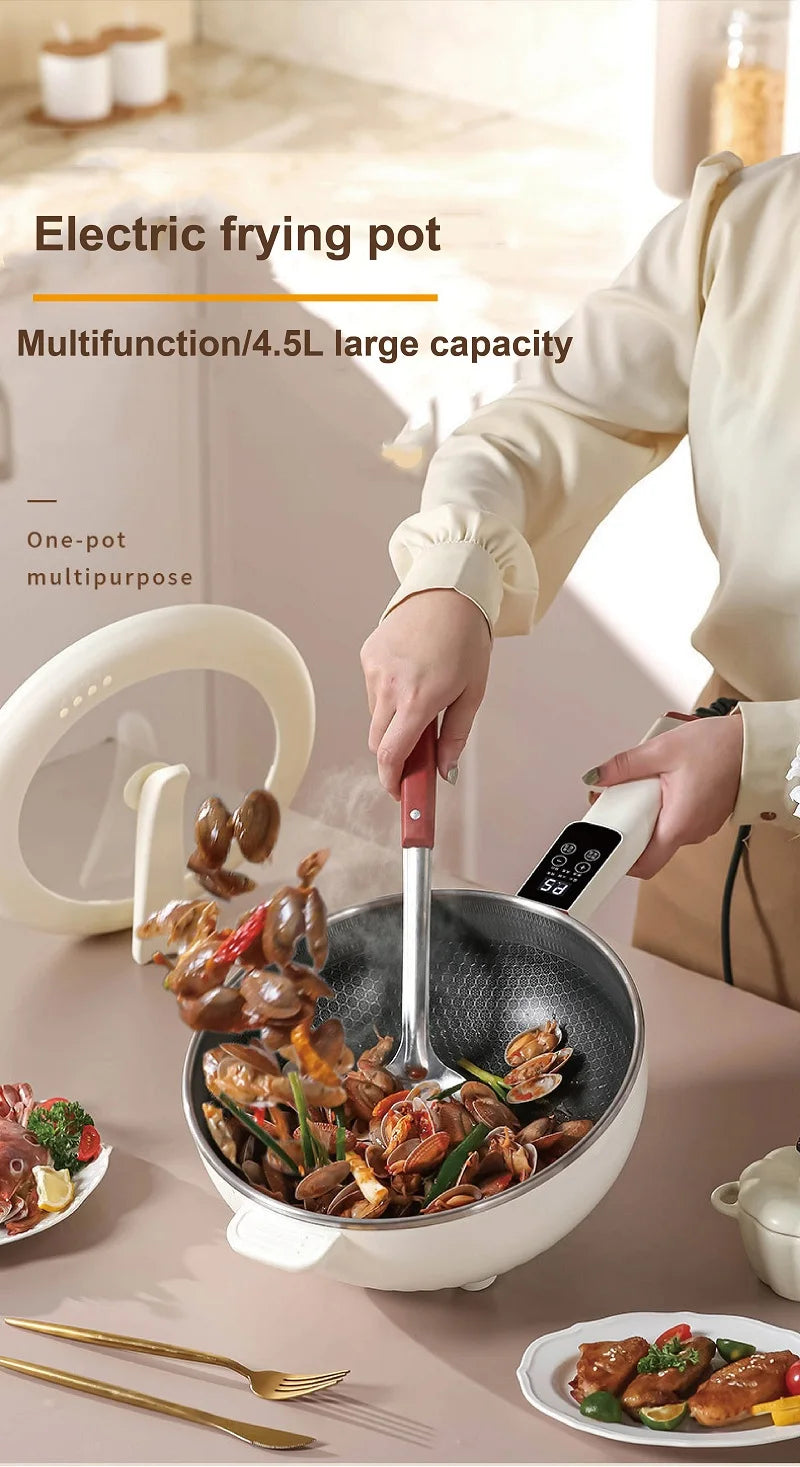 Multi-function 4.5L electric frying pot with control buttons and ingredients being cooked