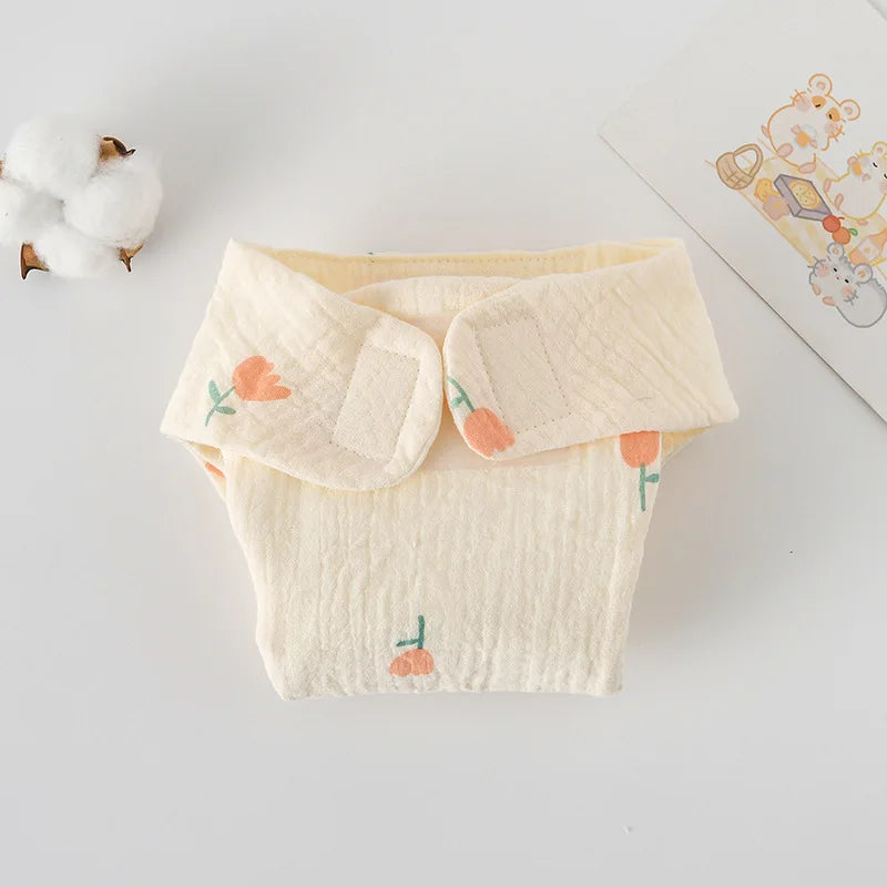 Cream cotton baby diaper cover with orange tulip print, soft reusable infant baby care diaper.