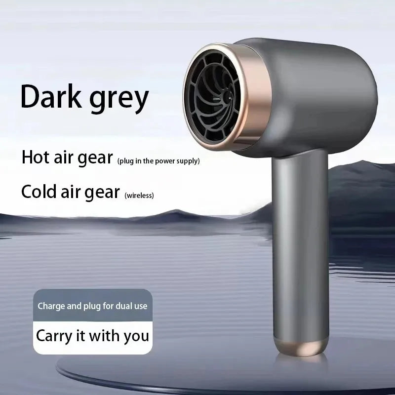 Dark grey portable USB rechargeable hair dryer with rose gold accents for wireless cold and corded hot air styling.