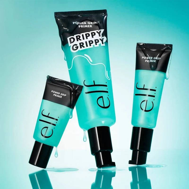 e.l.f. Power Grip Drippy Grippy Primer tubes in teal with clear, gel-like texture dripping down on a blue background.