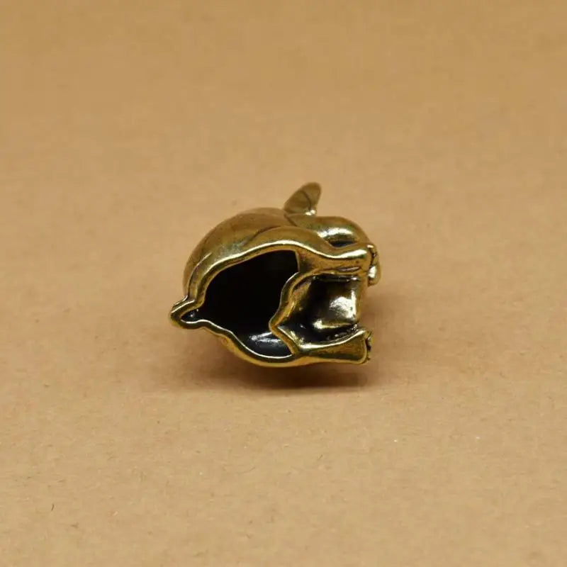 Small antique brass puppy figurine, a solid metal collectible tea pet ornament for desk decor.