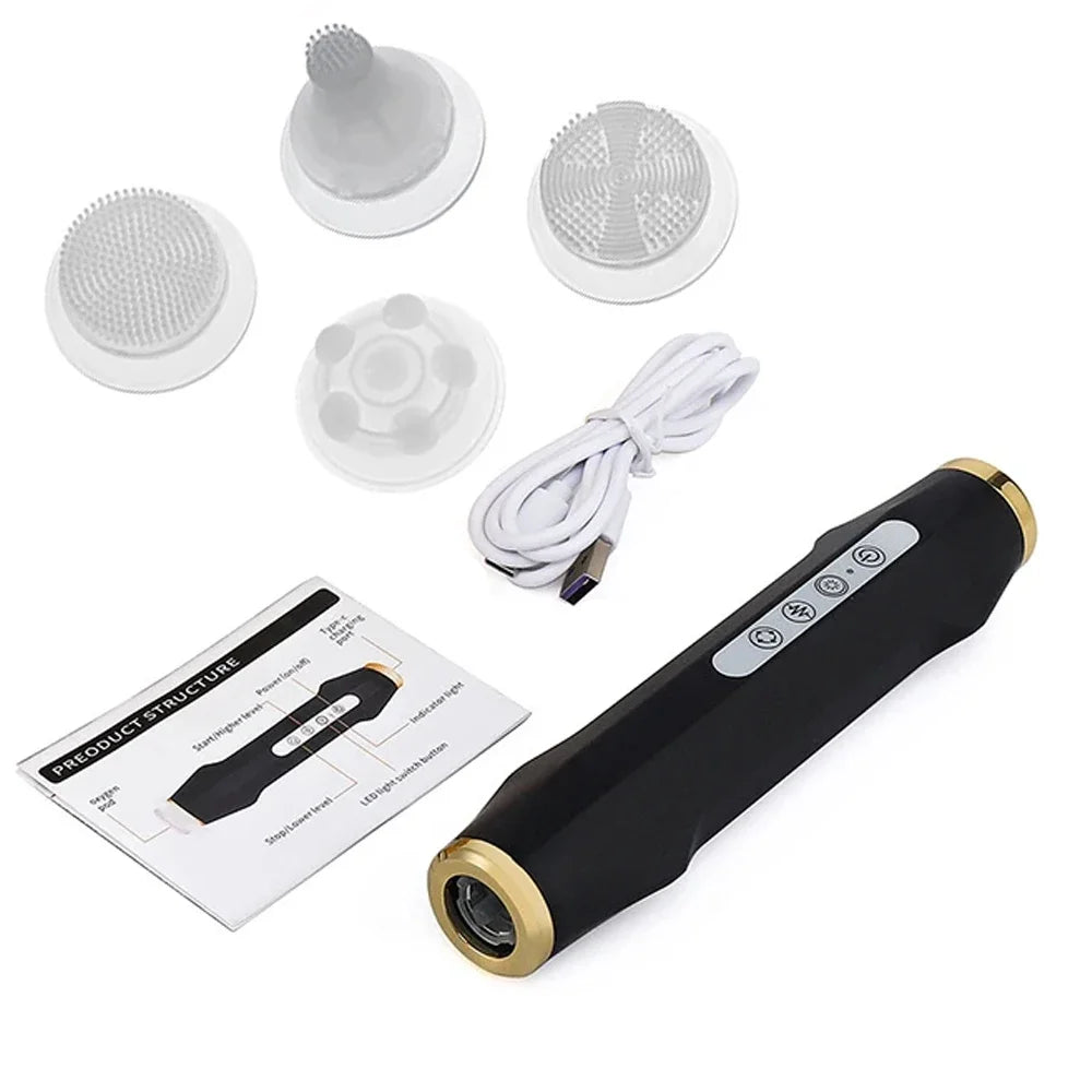 Black and gold handheld facial device with four silicone attachment heads, USB cable, and instruction manual.